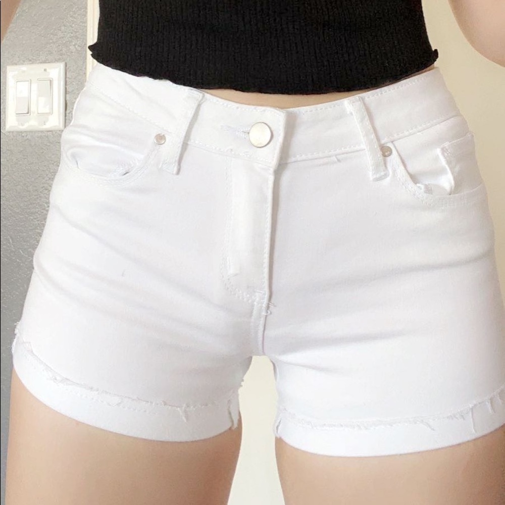 white non ripped white jean shorts